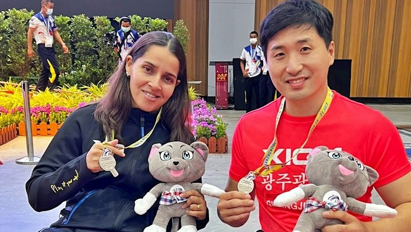 Cátia Oliveira com o parceiro de dupla mista, Kim 