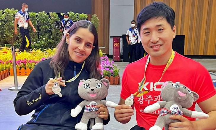 Cátia Oliveira com o parceiro de dupla mista, Kim 