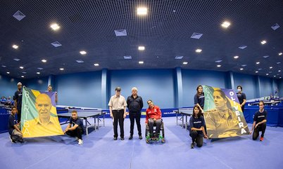 Biriba e Cátia Oliveira são homenageados com bandeirões no TMB Platinum